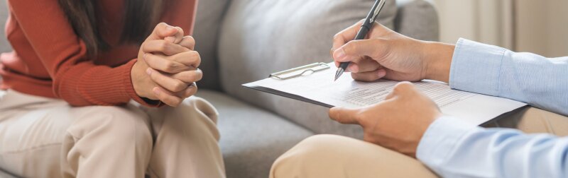 Male counselor during a session with mental health patient.