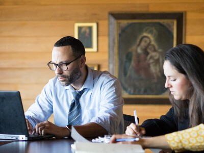 Students studying around a table