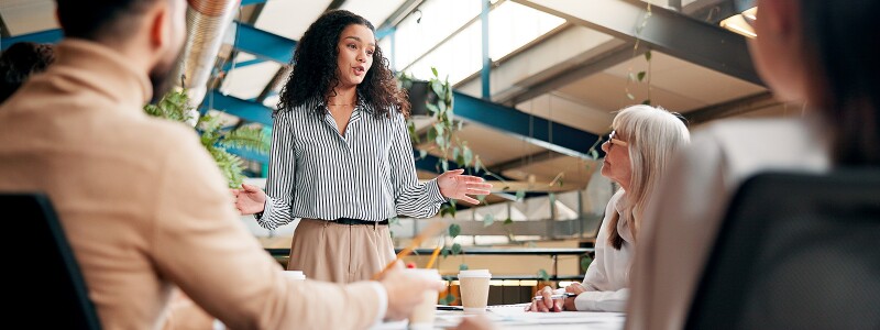 Woman leading a marketing team meeting