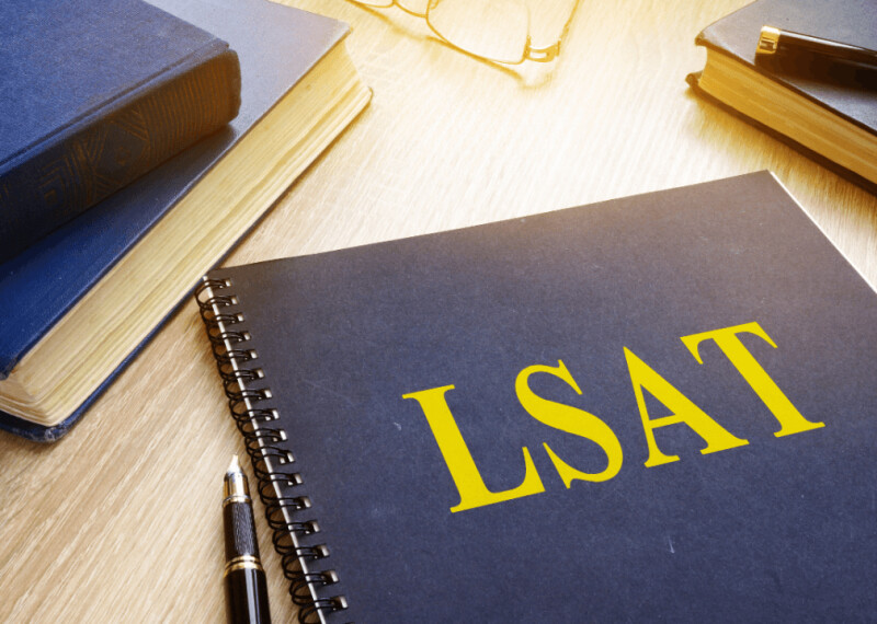 Pen and LSAT study materials on a desk