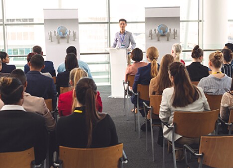 Room-Of-Attendees-Listening-To-Presenter-At-Professional-Counseling-Conference