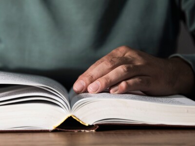 Man reading a business management book