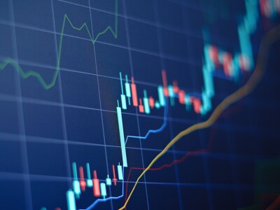 Closeup data chart with uptrend line candlestick graph