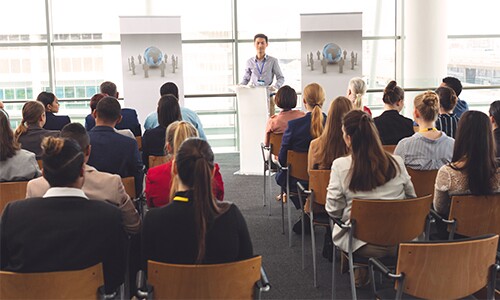 Room-Of-Attendees-Listening-To-Presenter-At-Professional-Counseling-Conference