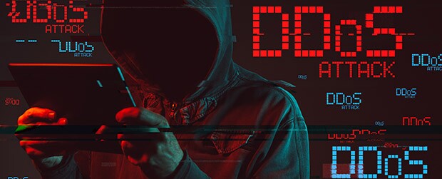 DDos attack types hacker with tablet