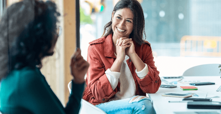 Two women collaborating in an office environment