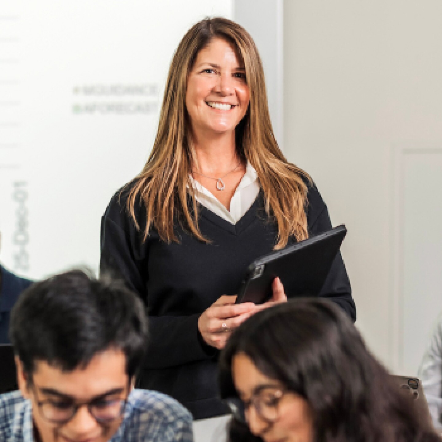 A female CSUMB student smiling during the global consulting project.