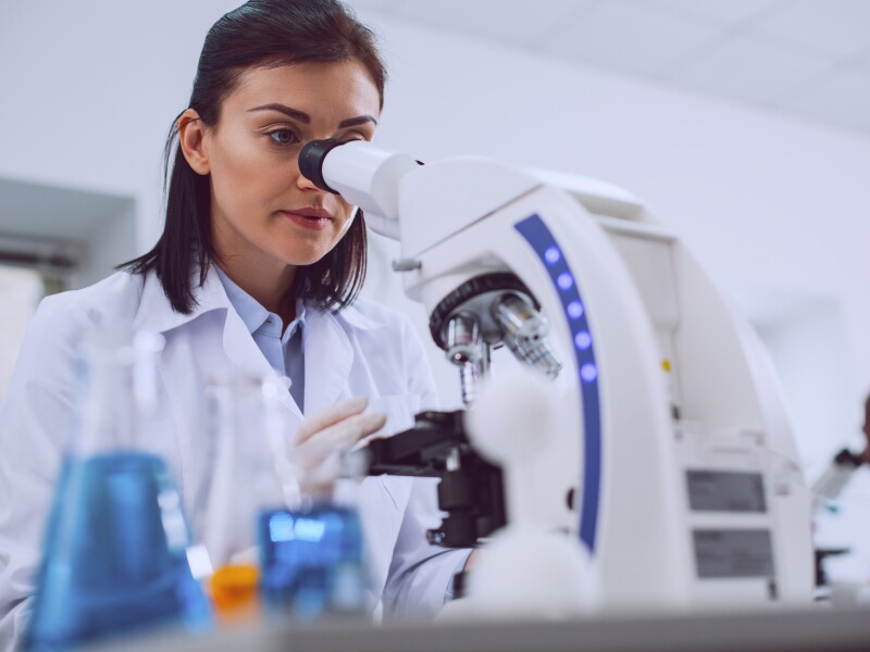 Concentrated biologist working in the lab
