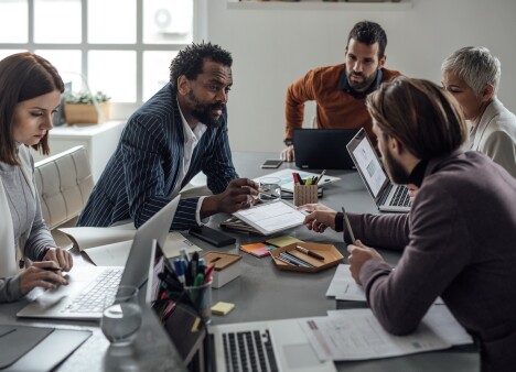group-of-coworkers-sitting-in-meeting