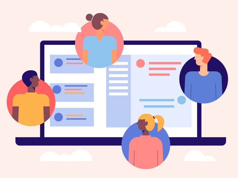 A group of people facing a computer screen