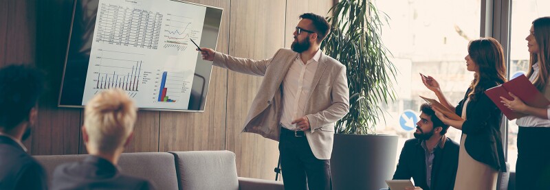 CFO giving a presentation to colleagues