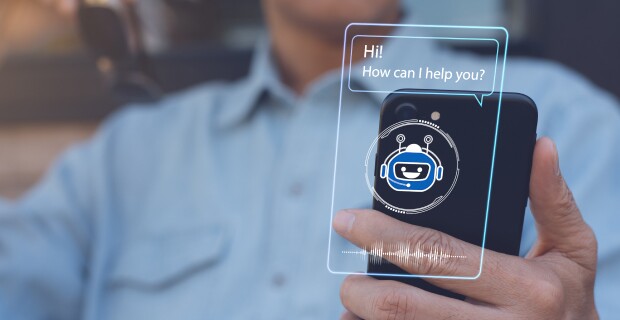 close up image of a smart phone with Hi how can I help you bubble