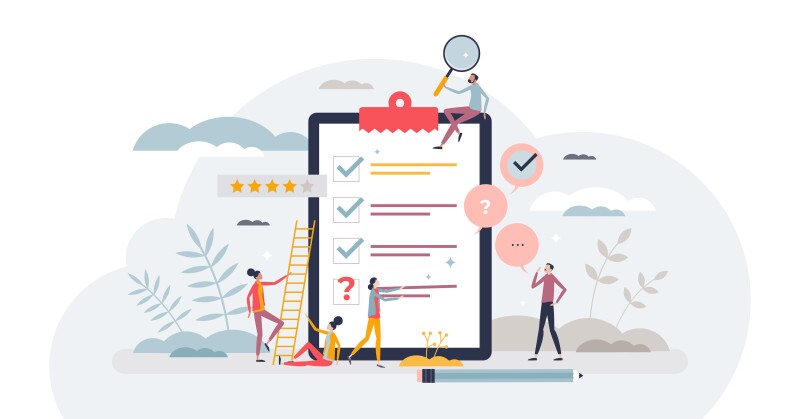 A group of people working on a checklist