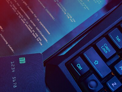 Credit card on top of keyboard and tablet computer