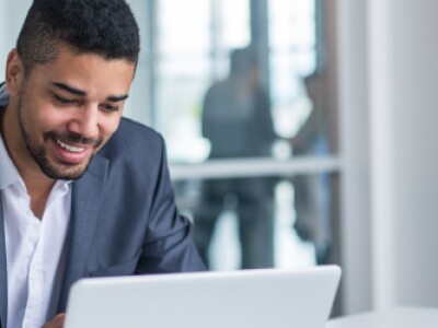 Businessman focused on laptop in the office