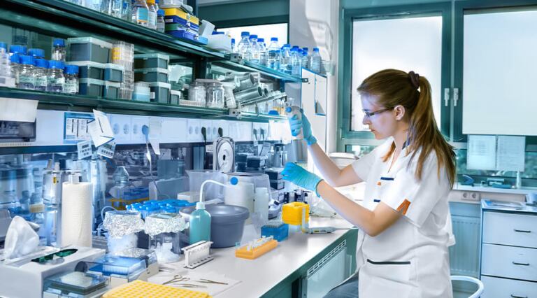 Female epidemiologist working in a lab