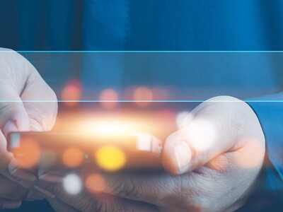 Man on smart phone with the overlay of a search bar