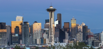 Skyline of Seattle with snow-capped mountain in background