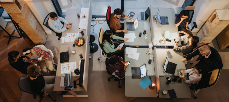 people in an office working productively