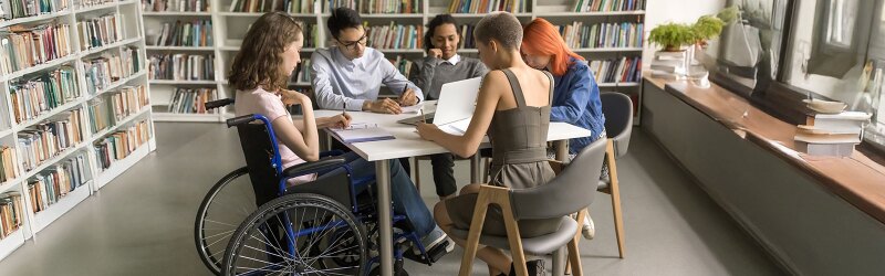 A group of students working together at a table.