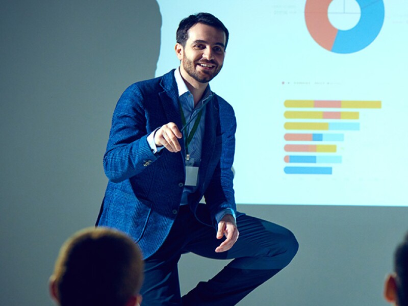 Businessman presenting data to his team