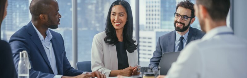 Multi-Ethnic Office Conference Room Meeting: Diverse Team of Top Managers, Executives, Share Digital Tablet Computer Talk.