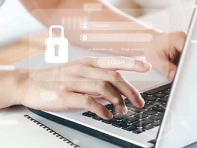 developer on laptop using reverse engineering software