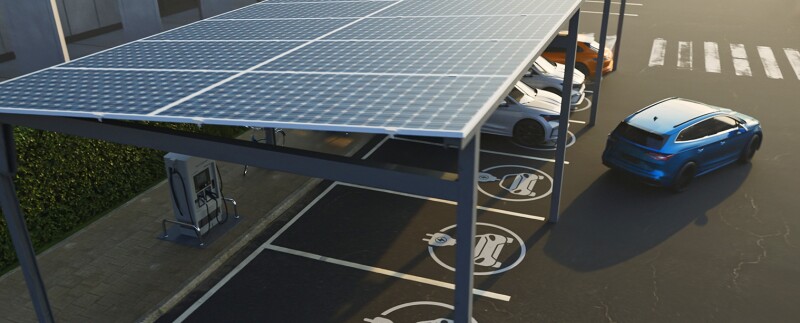 Corporate parking lot featuring solar panels and electric car charging stations