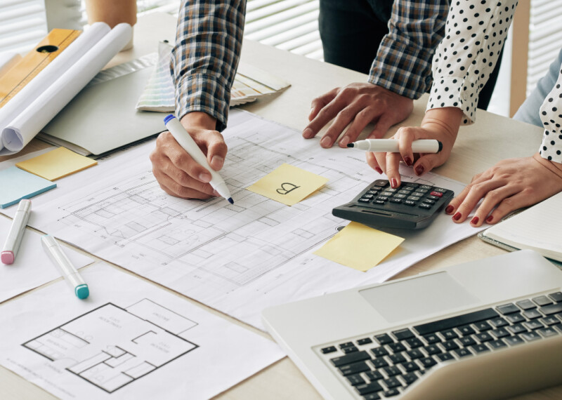 cost estimator reviewing schematics