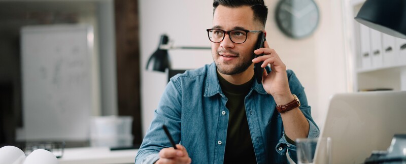 Man on phone negotiating his salary