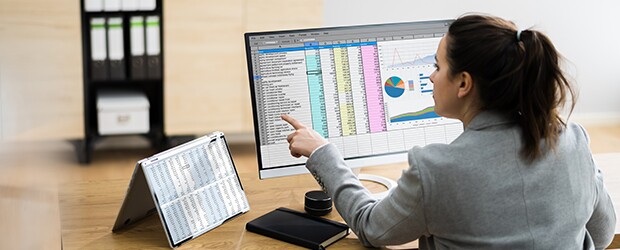 Woman reviewing finance charts