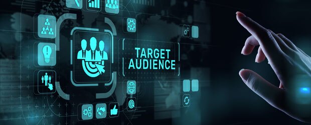 Poised over a screen, a hand points to a button reading, "Target Audience"