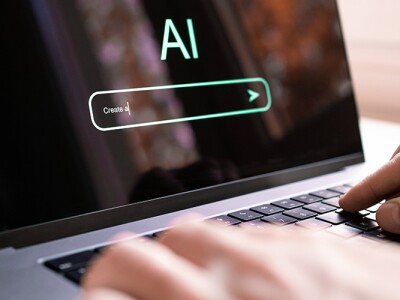 Person using AI prompt to generate content