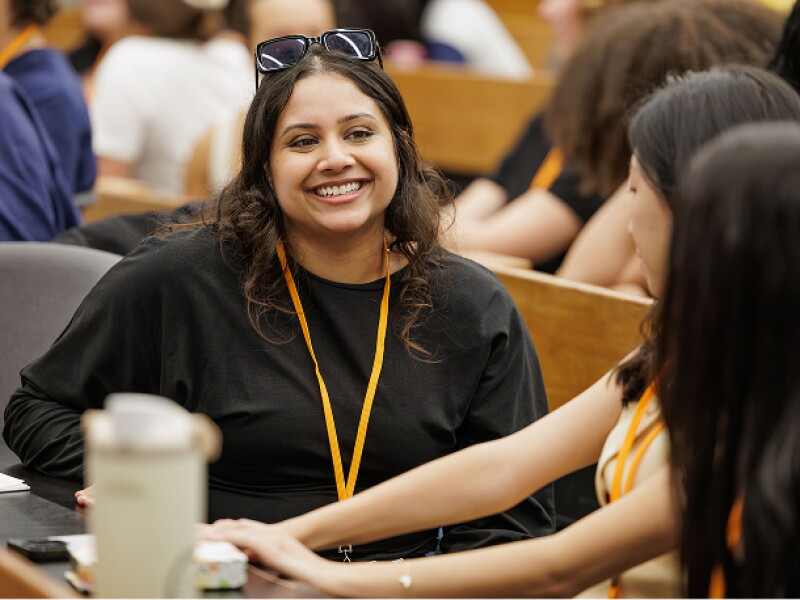 Smiling University of Illinois students during orientation.