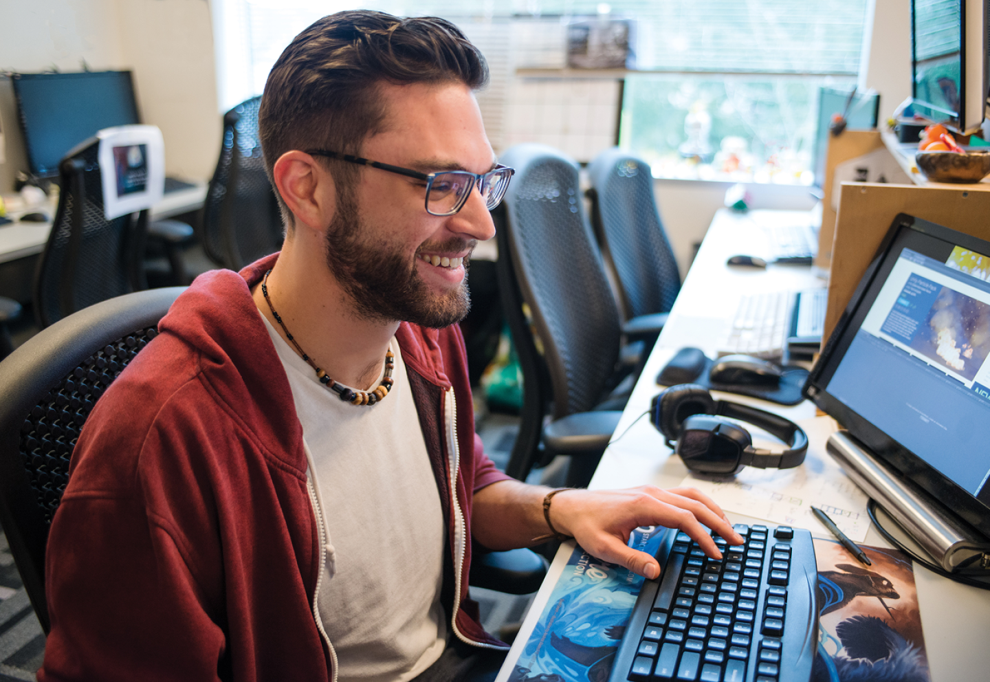 Student working at a computer workstation.