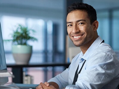 Google MBA intern in office working on computer