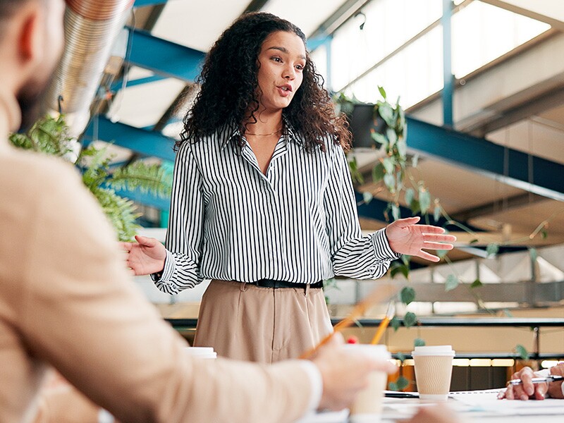 Woman leading a marketing team meeting