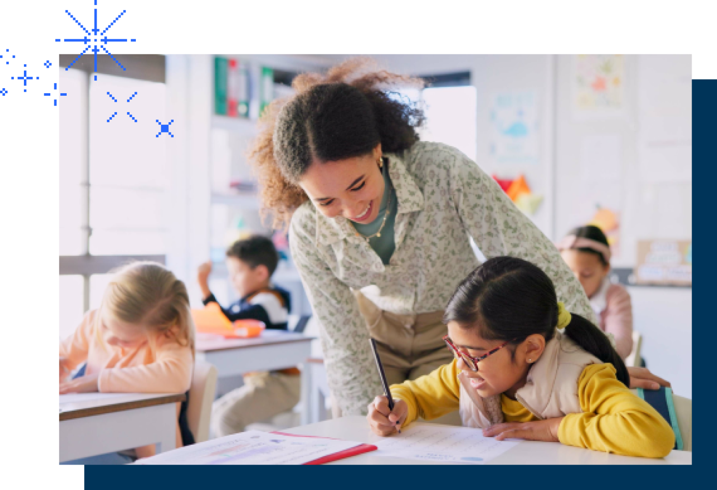 A female teacher is helping a student with her homework.