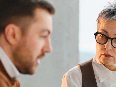 A counselor listens attentively to her client.
