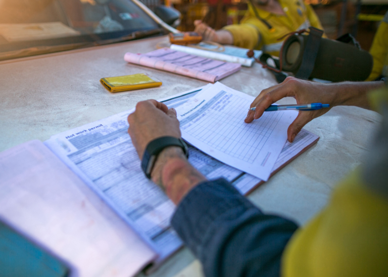 compliance officer reviewing permits