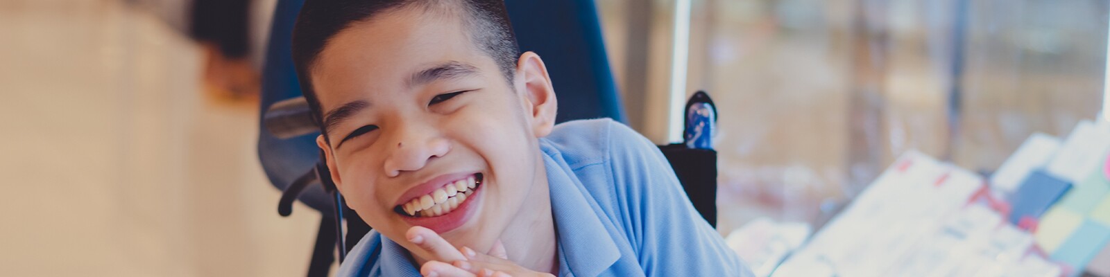 boy-in-wheelchair-smiling.jpg