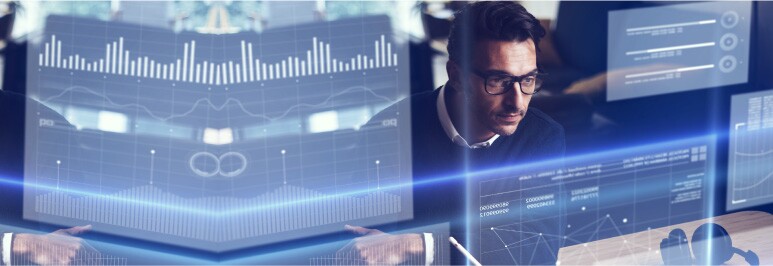 Man in sweater stars at superimposed business data sets