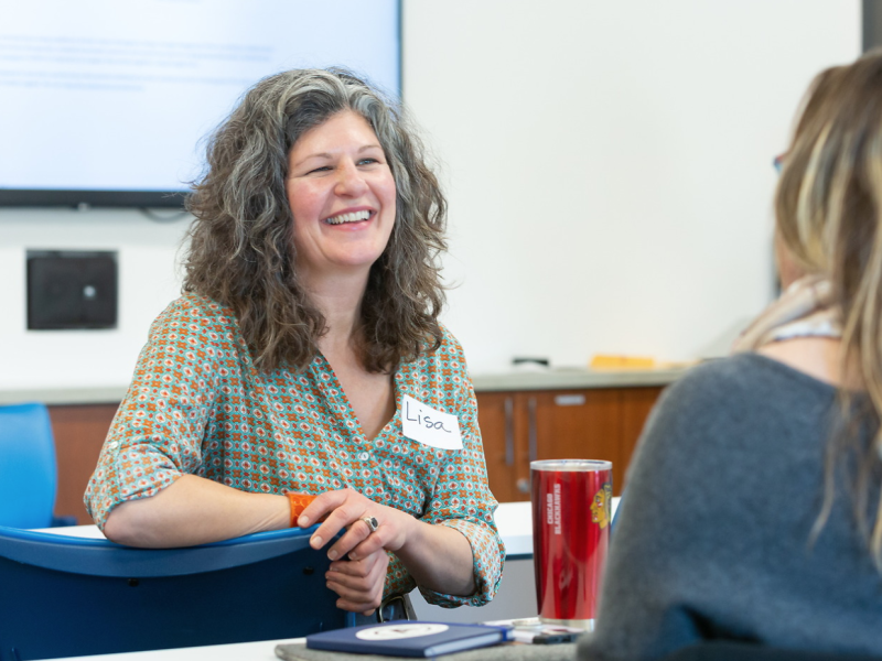 Women with nametags networking at DePaul event