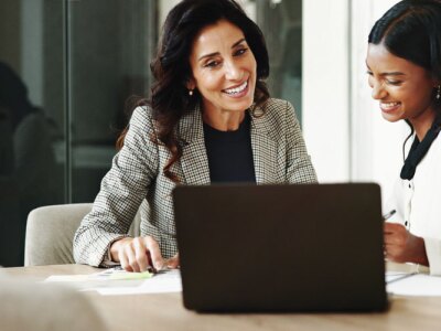 Meeting, women and business people with laptop in office, investment project and discussion.