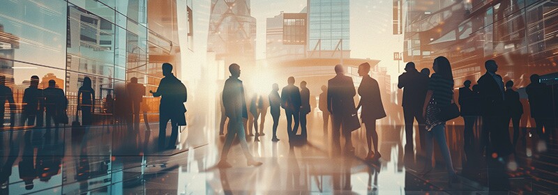 Double exposure image of many business people meeting in a city
