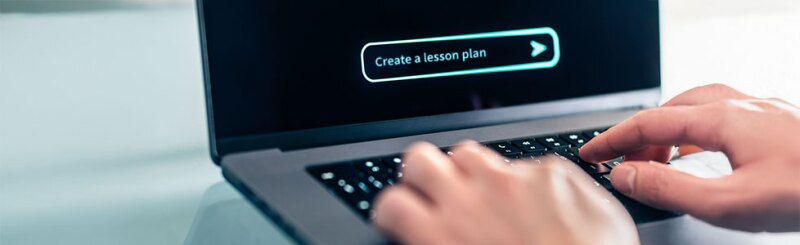 Teacher using AI on laptop to create a lesson plan