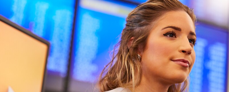Determined businesswoman smiling in office