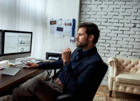 man-focused-working-at-desk