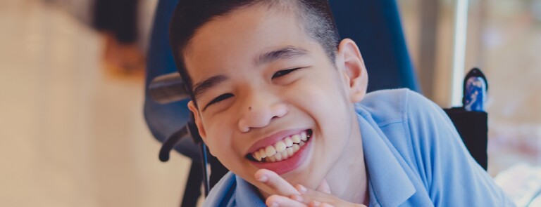 boy-in-wheelchair-smiling.jpg