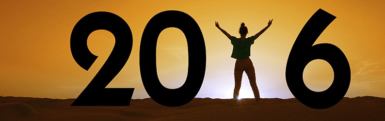 2016, silhouette of a woman standing in the sunset